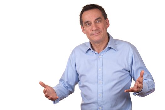 Smiling Middle Age Man in Blue Shirt with Raised Hands Talking and Explaining Something Isolated