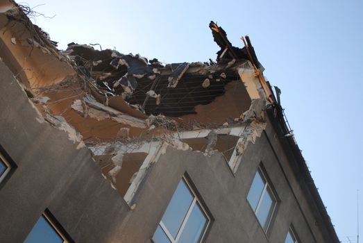 Demolishing a building.