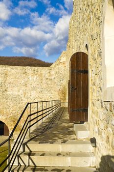 Door open in an old castle