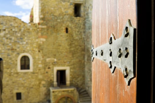 Door open in an old castle