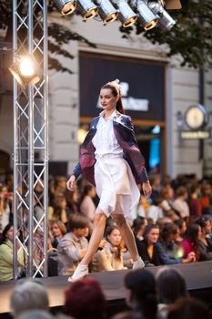 PRAGUE-SEPTEMBER 24: A model walks the runway during the 2011 autumn/winter Czech designers collection during the Prague Fashion Weekend on September 24, 2011 in Prague, Czech Republic.