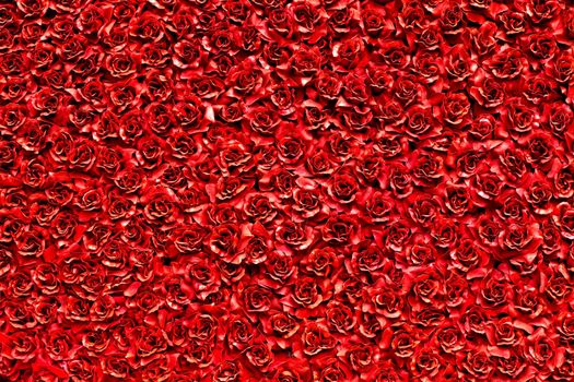 Red artificial rose background ,natural texture of love