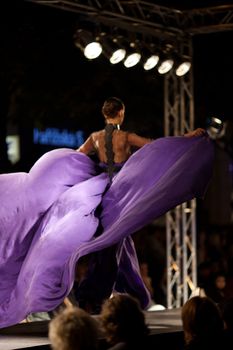 PRAGUE-SEPTEMBER 24: A model walks the runway during the 2011 autumn/winter Nina Ricci Paris Collection by Obsession during the Prague Fashion Weekend on September 24, 2011 in Prague, Czech Republic.