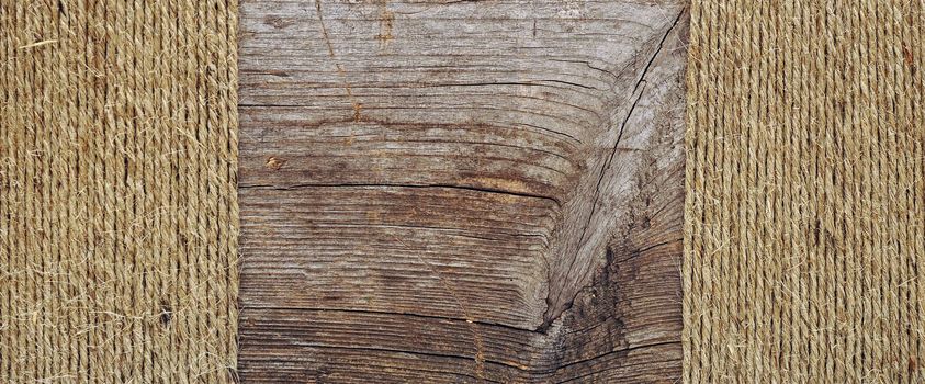 ropes borders on weathered wood background 