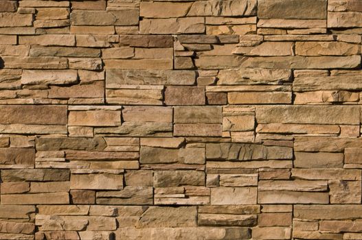 Irregular sized brown bricks with an organic feel. Image is seamlessly tileable