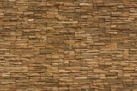 Irregular sized brown bricks with an organic feel. Image is seamlessly tileable