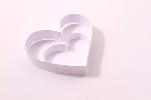 Paper hearts on white background