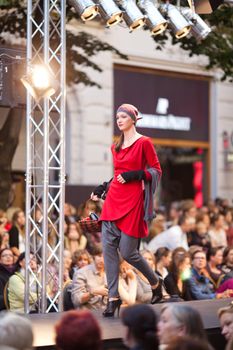 PRAGUE-SEPTEMBER 24: A model walks the runway during the 2011 autumn/winter Czech designers collection during the Prague Fashion Weekend on September 24, 2011 in Prague, Czech Republic.