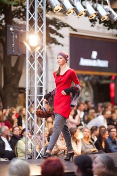 PRAGUE-SEPTEMBER 24: A model walks the runway during the 2011 autumn/winter Czech designers collection during the Prague Fashion Weekend on September 24, 2011 in Prague, Czech Republic.