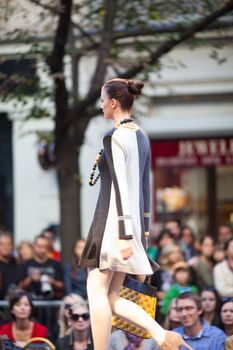 PRAGUE-SEPTEMBER 24: A model walks the runway during the 2011 autumn/winter Czech designers collection during the Prague Fashion Weekend on September 24, 2011 in Prague, Czech Republic.