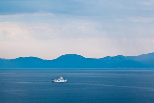 Boat Passing Island of Brac in the Rainy Morning, Croatia