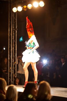 PRAGUE-SEPTEMBER 24: A model walks the runway during the 2011 autumn/winter Nina Ricci Paris Collection by Obsession during the Prague Fashion Weekend on September 24, 2011 in Prague, Czech Republic.