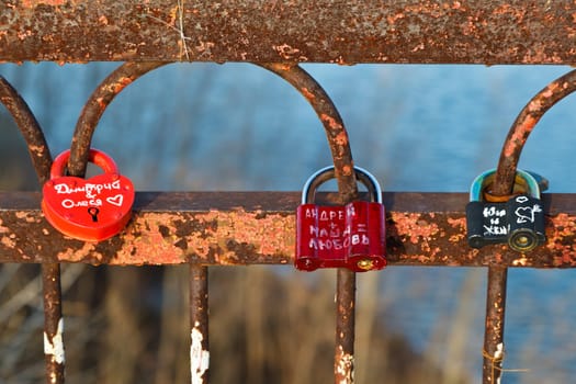 Love Locks on the Rusty Bridge across Volga River near Samara, Russia