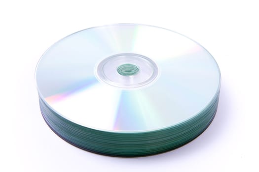 Stack of compact discs on white