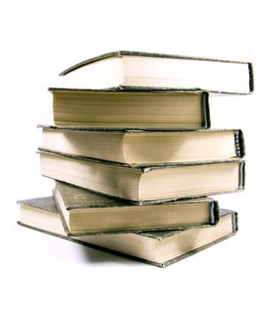 Stack of old books isolated on white.