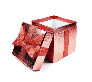 Opened red shining gift box isolated on white.