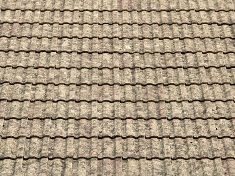 view of a roof with gray tiles structure