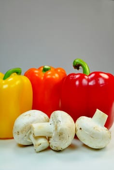 Fresh vegetables: peppers and mushrooms