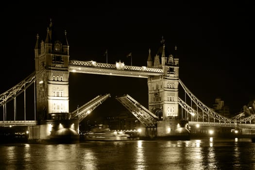 Tower bridge is opne by night  Black & white