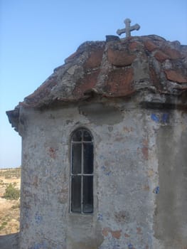 Top of old orthodox church with cross                               