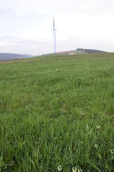 windmill on lush irish countryside landscape in glenough county tipperary ireland