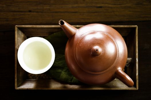 Japanese green tea with wooden tray