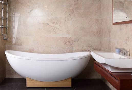 Interior of brand new bathroom with mirror