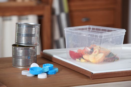 Recyclable objects on kitchen surface