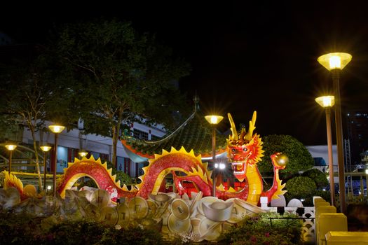 SINGAPORE - JANUARY 11: Chinese New Year Dragon Decoration on Overhead Bridge in the New Bridge Road, Singapore Chinatown