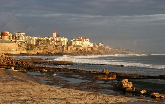 Beautiful sunset light on the beach of Estoril, Portugal