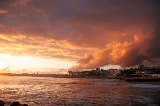 Beautiful sunset on the beach of Estoril, Portugal