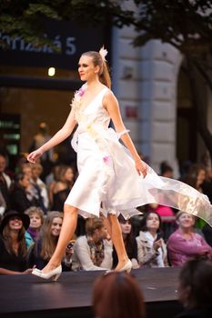 PRAGUE-SEPTEMBER 24: A model walks the runway during the 2011 autumn/winter Czech designers collection during the Prague Fashion Weekend on September 24, 2011 in Prague, Czech Republic.