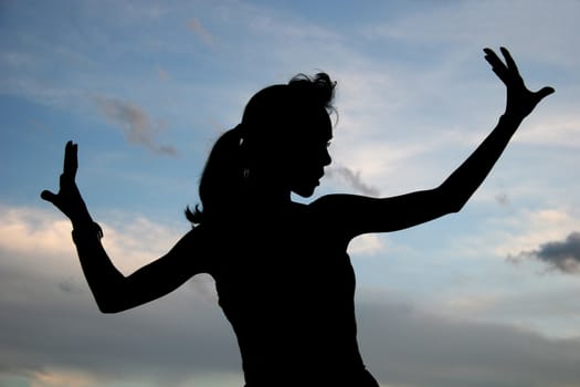 Silhouette Of A Woman And The Sky