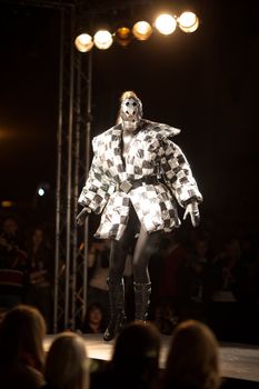 PRAGUE-SEPTEMBER 24: A model walks the runway during the 2011 autumn/winter Nina Ricci Paris Collection by Obsession during the Prague Fashion Weekend on September 24, 2011 in Prague, Czech Republic.