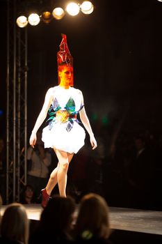 PRAGUE-SEPTEMBER 24: A model walks the runway during the 2011 autumn/winter Nina Ricci Paris Collection by Obsession during the Prague Fashion Weekend on September 24, 2011 in Prague, Czech Republic.