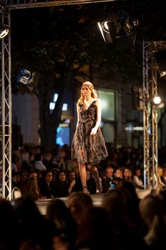 PRAGUE-SEPTEMBER 24: A model walks the runway during the 2011 autumn/winter Nina Ricci Paris Collection by Obsession during the Prague Fashion Weekend on September 24, 2011 in Prague, Czech Republic.