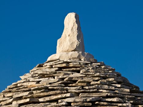 stone roof on the old house and blue sky
