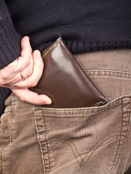 hand taking wallet from the pocket
