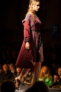 PRAGUE-SEPTEMBER 24: A model walks the runway during the 2011 autumn/winter Nina Ricci Paris Collection by Obsession during the Prague Fashion Weekend on September 24, 2011 in Prague, Czech Republic.