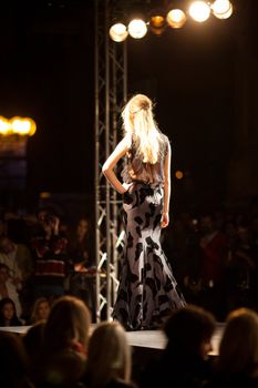 PRAGUE-SEPTEMBER 24: A model walks the runway during the 2011 autumn/winter Nina Ricci Paris Collection by Obsession during the Prague Fashion Weekend on September 24, 2011 in Prague, Czech Republic.