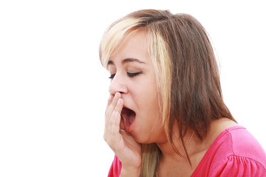 Yawning tired woman, caucasian model isolated on white background.