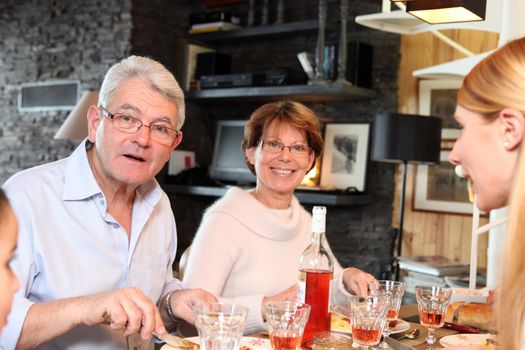 Family enjoying meal together