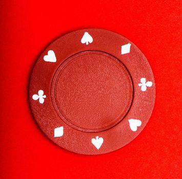 red chip for poker on table