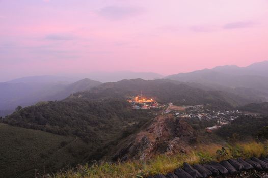 Sunrise on the mountains at the Thai - Myanmar border ridge in Kanchanaburi, Thailand.