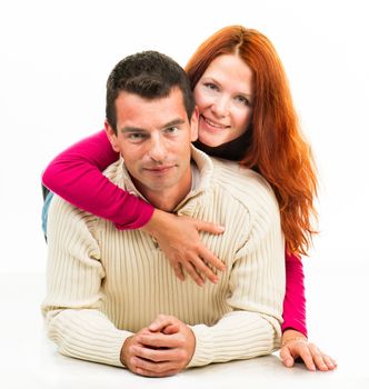 Young happy couple on white background