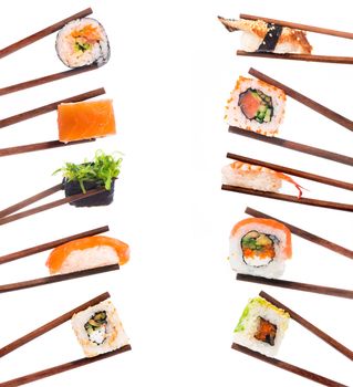 Set of sushi with chopsticks shot on white