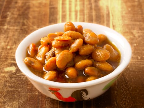 close up of a bowl of salted fermented soy beans