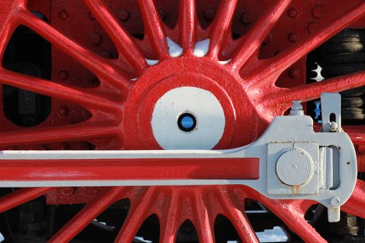 The wheels of the old steam locomotive, a fragment, close-up