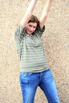 Female tomboy posing outside.