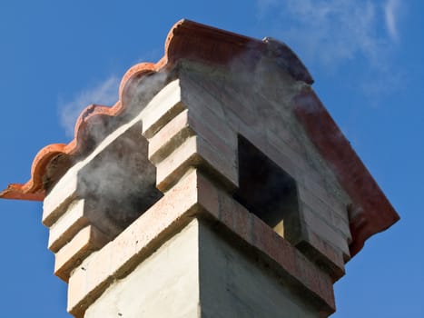 chimney smoking on the roof